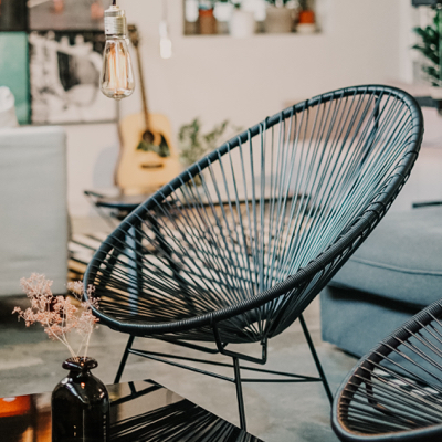 A round wire black chair.