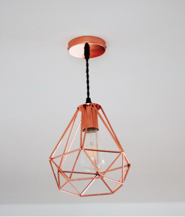 A bronze geometric ceiling light fixture.